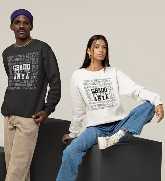 Two people wearing sweatshirts with text design on a plain background