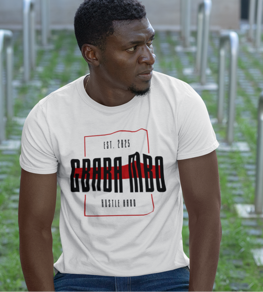 Man wearing a white t-shirt with text in an outdoor setting